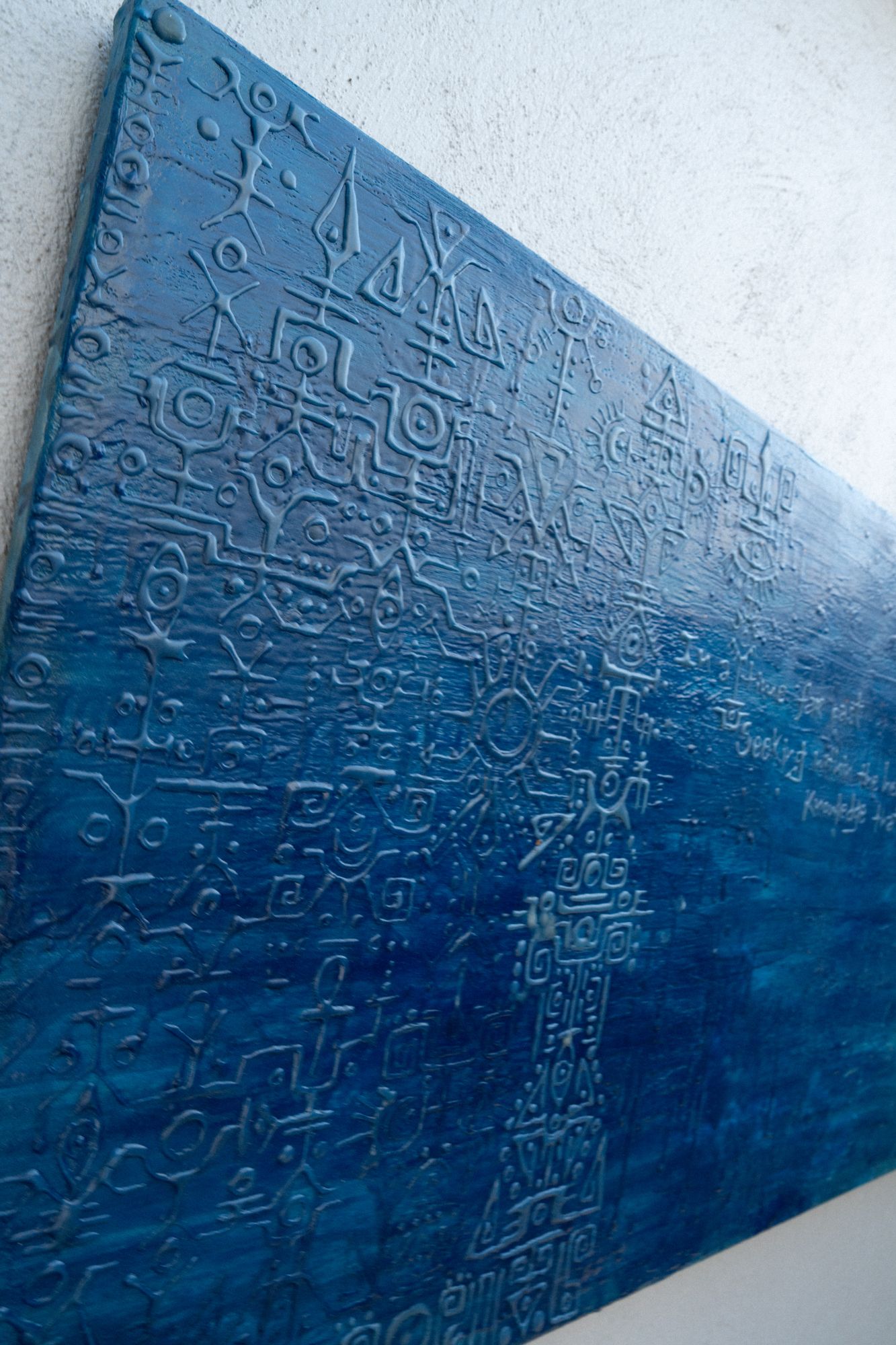 Relief glyphs raking sunlight